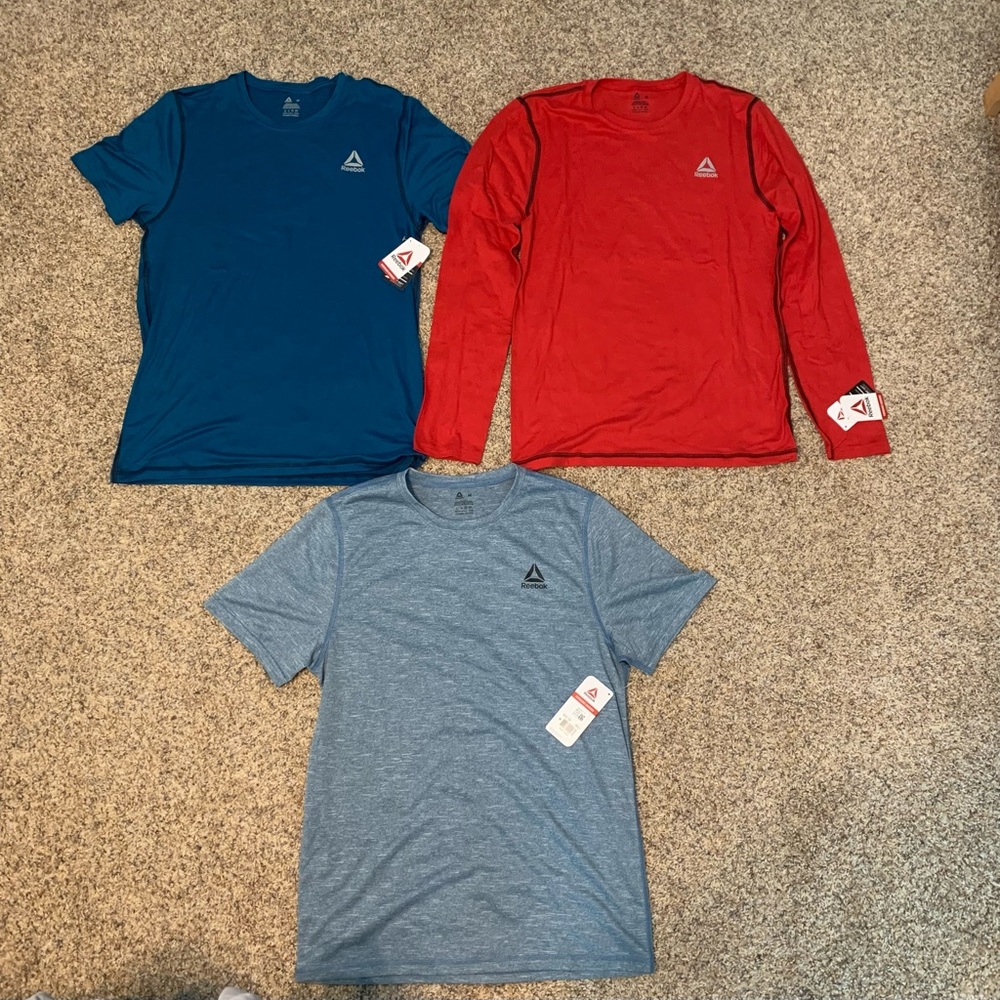 Lot of 3 Mens Reebok Workout Shirts. Brand New with Tags. Size Mens Medium